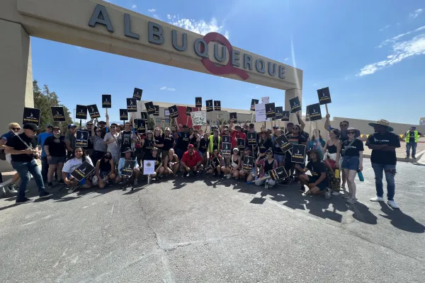 Picketers pose for a group picture