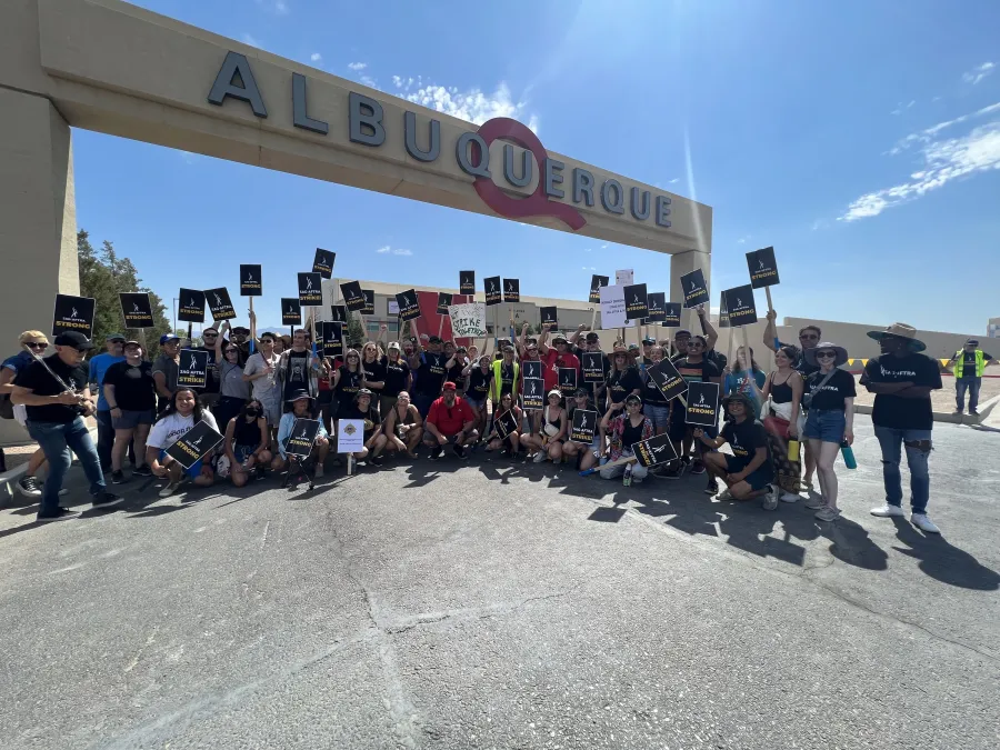 Picketers pose for a group picture